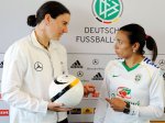 Marta (right) talks to Germany star Birgit Prinz in the press conference in Frankfurt
